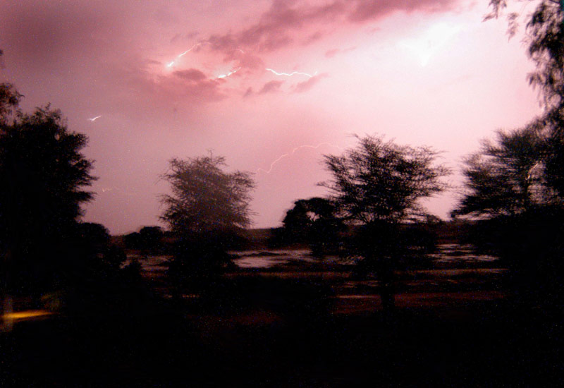 Travel Photo Essay: Cell Phone-Wielding Shamans Call Rain in South African 
                          Desert